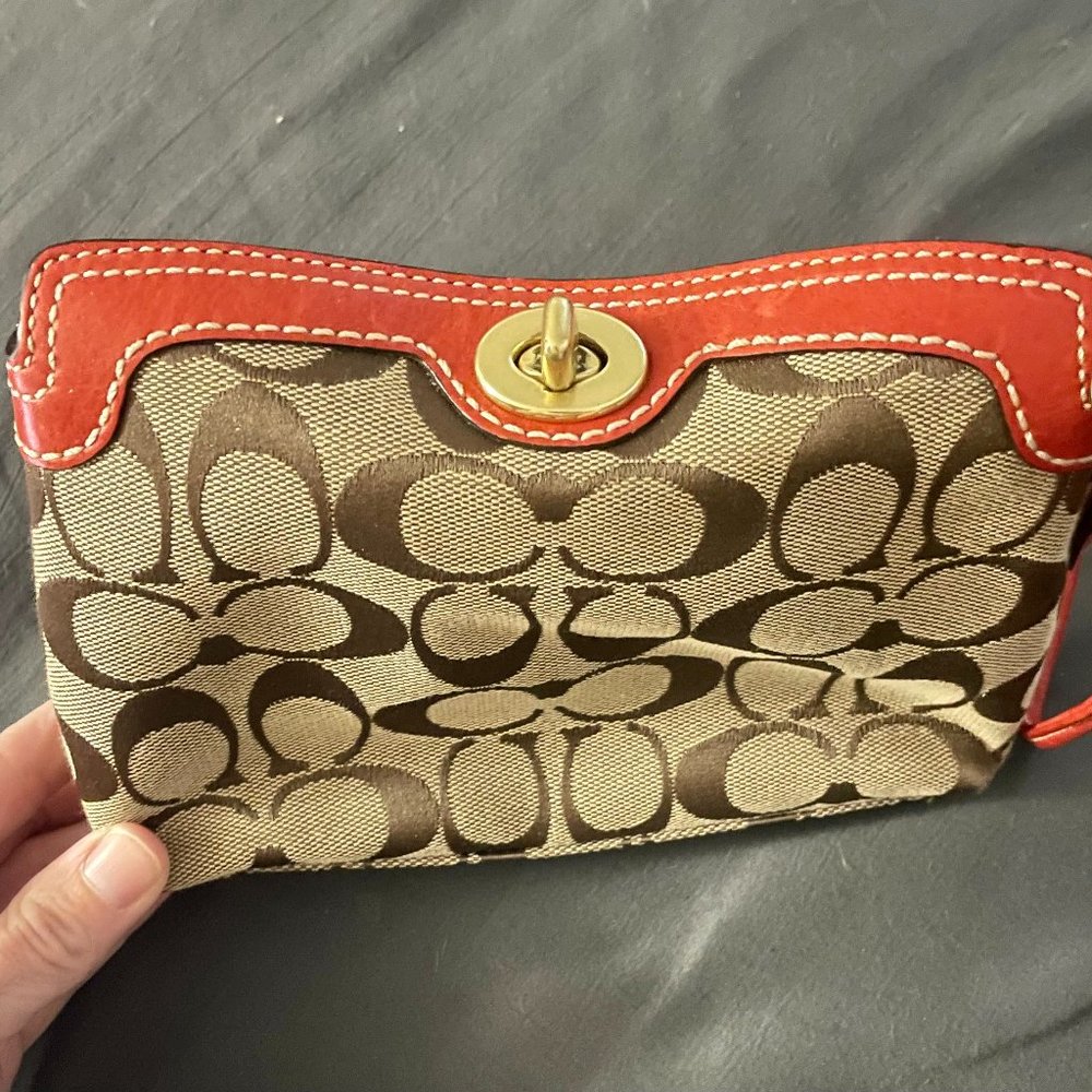 Coach Signature Jacquard Canvas Wristlet.